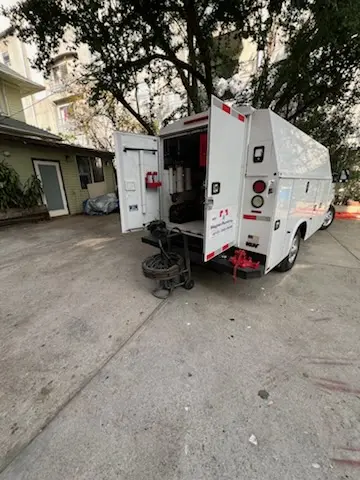 Magnet Plumbing service vehicle on-site for Grease Trap Cleaning in North Weeki Wachee